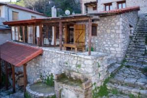 Stone house on the rock Parnassos Greece