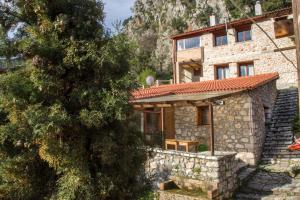 Stone house on the rock Parnassos Greece