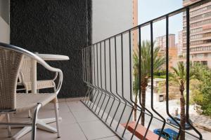 Double Room with Balcony (2 Adults + 1 Child) room in Hotel El Palmeral