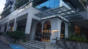 Palm Tree Condos across NAIA3 by Beth