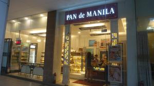 Palm Tree Condos across NAIA3 by Beth