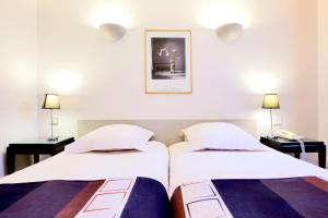 Hotels Kyriad Nimes Centre : photos des chambres