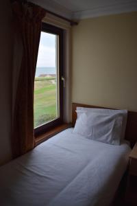 Single Room with Sea View room in GOLF View Hotel & Macintosh Restaraunt