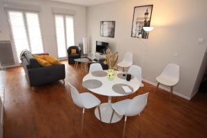 Appartement face Vallée Village et très proche Disney