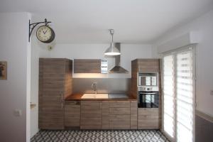 Appartement face Vallée Village et très proche Disney