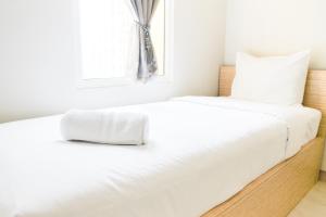 Simply Minimalist 2BR The Springlake Summarecon Apartment By Travelio