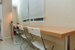 Minimalist 2BR Apartment at Parahyangan Residence By Travelio