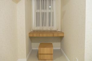 Minimalist 2BR Apartment at Parahyangan Residence By Travelio