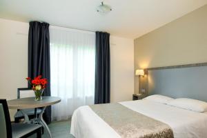 Appart'hotels Sejours & Affaires Reims Clairmarais : photos des chambres