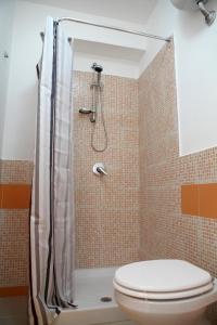 Quadruple Room with Private Bathroom room in B&B Le Dune Beach