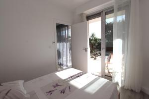 Appartements Lovely One bedroom, Pool, Garden and Parking #17 : photos des chambres