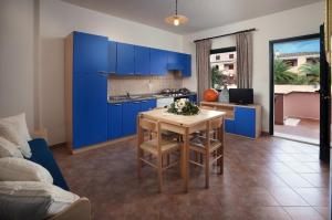 Three-Bedroom Apartment (8 Adults) room in Appartamenti Le Ginestre e Gli Oleandri