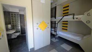 Bed in 6-Bed Mixed Dormitory Room room in The Hive Party Hostel Budapest