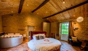 Maisons d'hotes Le Portail en Marais Poitevin - Logis d'Exception - Jacuzzi Privatif : photos des chambres