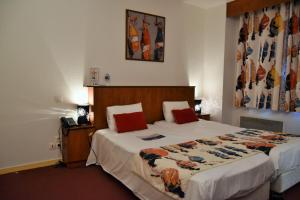 Hotels Kyriad Hotel - Restaurant Carentan : photos des chambres