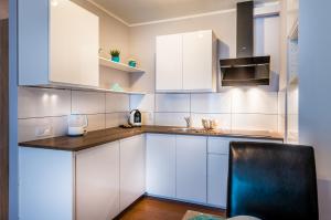 Apartament B&F Garbary Poznań Business & Family - Parking