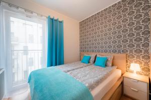 Apartament B&F Garbary Poznań Business & Family - Parking