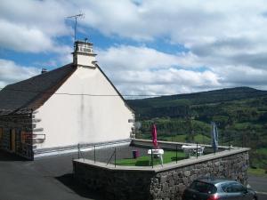 Appartements Vacances au pied des Monts du Cantal : photos des chambres