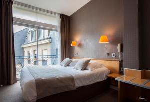 Hotels Hotel Des Lices : photos des chambres