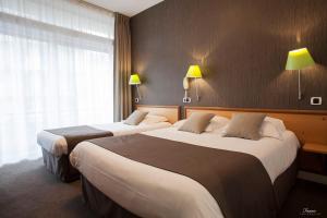 Hotels Hotel Des Lices : photos des chambres