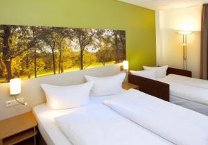 Double Room with Sofa Bed room in Anders Hotel Walsrode