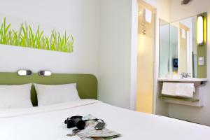 Hotels ibis budget Lyon Est Chaponnay : Chambre Triple Standard