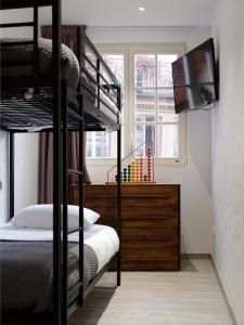 Appartements Les Suites Du Cygne : photos des chambres