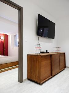 Appartements Les Suites Du Cygne : photos des chambres