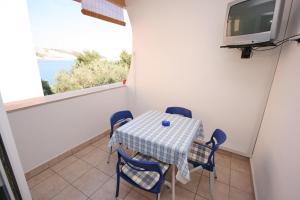 Two-Bedroom Apartment with Terrace and Sea View room in Apartment Stara Novalja 6301b