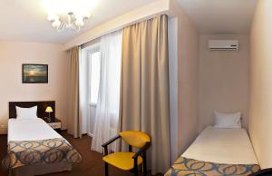 Economy Twin Room room in Barkhatnye Sezony Russky Dom Resort Sportivny Kvartal