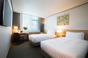 Phòng Hai Giường Đơn Loại Sang (Deluxe Twin Room)