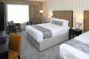 Family Room (2 Adults + 1 Child) room in Menlo Park Hotel