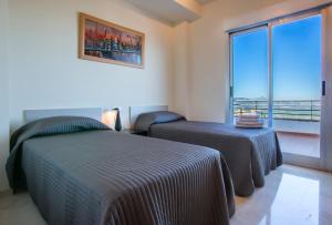 Three Bedroom Deluxe Sea View Apartment room in Complejo Bellavista Residencial