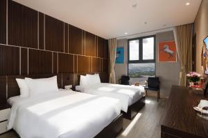 Phòng Deluxe 2 giường Hướng phố (Deluxe City View Twin Bed Room)