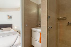 Appartements Appartement DELICE A : photos des chambres