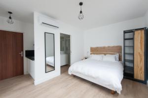 Appartements Le Jardin d Ambroise : photos des chambres