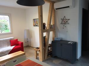 Appartements Gites au jardin : photos des chambres