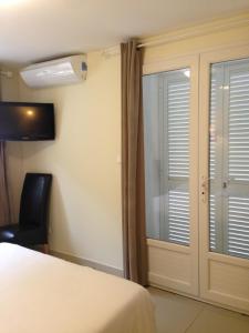 Hotels Le Jardin des Oliviers : photos des chambres