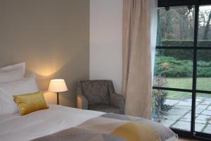 B&B / Chambres d'hotes Les Enclos Bed and Breakfast a 4 mn de Chantilly : photos des chambres