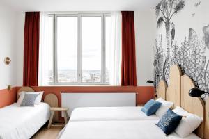 Auberges de jeunesse Caulaincourt Montmartre by Hiphophostels : Chambre Triple Deluxe