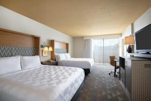 Premium Queen Room with Two Queen Beds and Balcony room in Holiday Inn Denver East an IHG Hotel