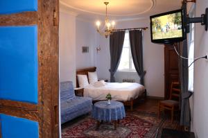 Hotels La Cour du Bailli Suites & Spa : photos des chambres