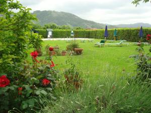 Two-Bedroom Apartment with Private Garden (4 Adults) room in Il Chicco d'Oro