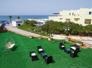white house by the sea Heraklio Greece