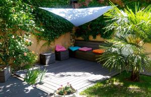 Sejours chez l'habitant Le Relais de Montchat : Chambre Quadruple - Vue sur Jardin