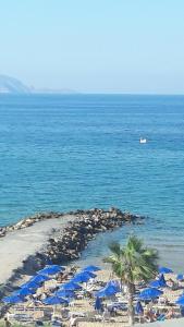 white house by the sea Heraklio Greece