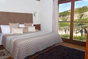 Suite with Terrace and Spa Bath room in Los Ojos de la Mora Apartamentos Boutique