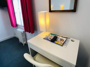 Hotels Cit'Hotel Le Volney : photos des chambres
