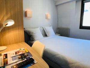 Hotels Cit'Hotel Le Volney : photos des chambres
