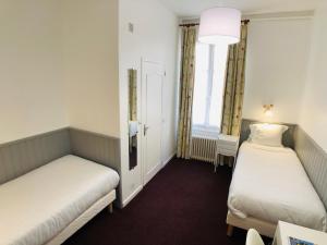 Hotels Cit'Hotel Le Volney : photos des chambres